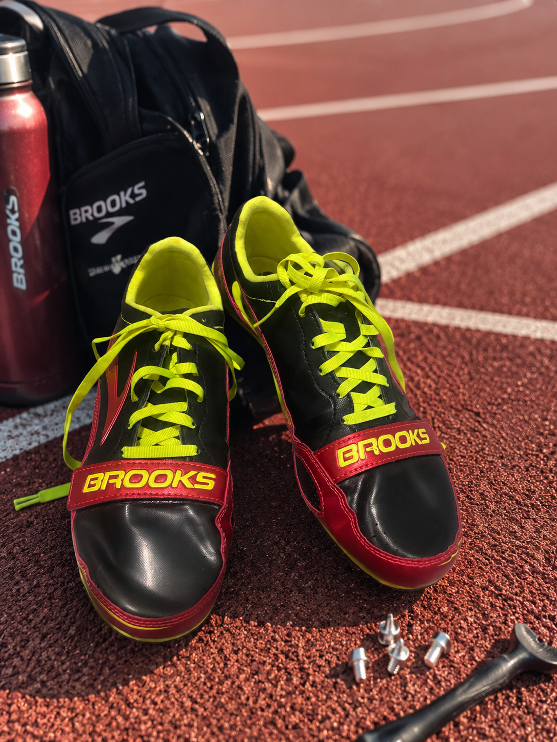 Brooks PR Sprint 10.45 track & field sprint spikes in a bold black, red and neon