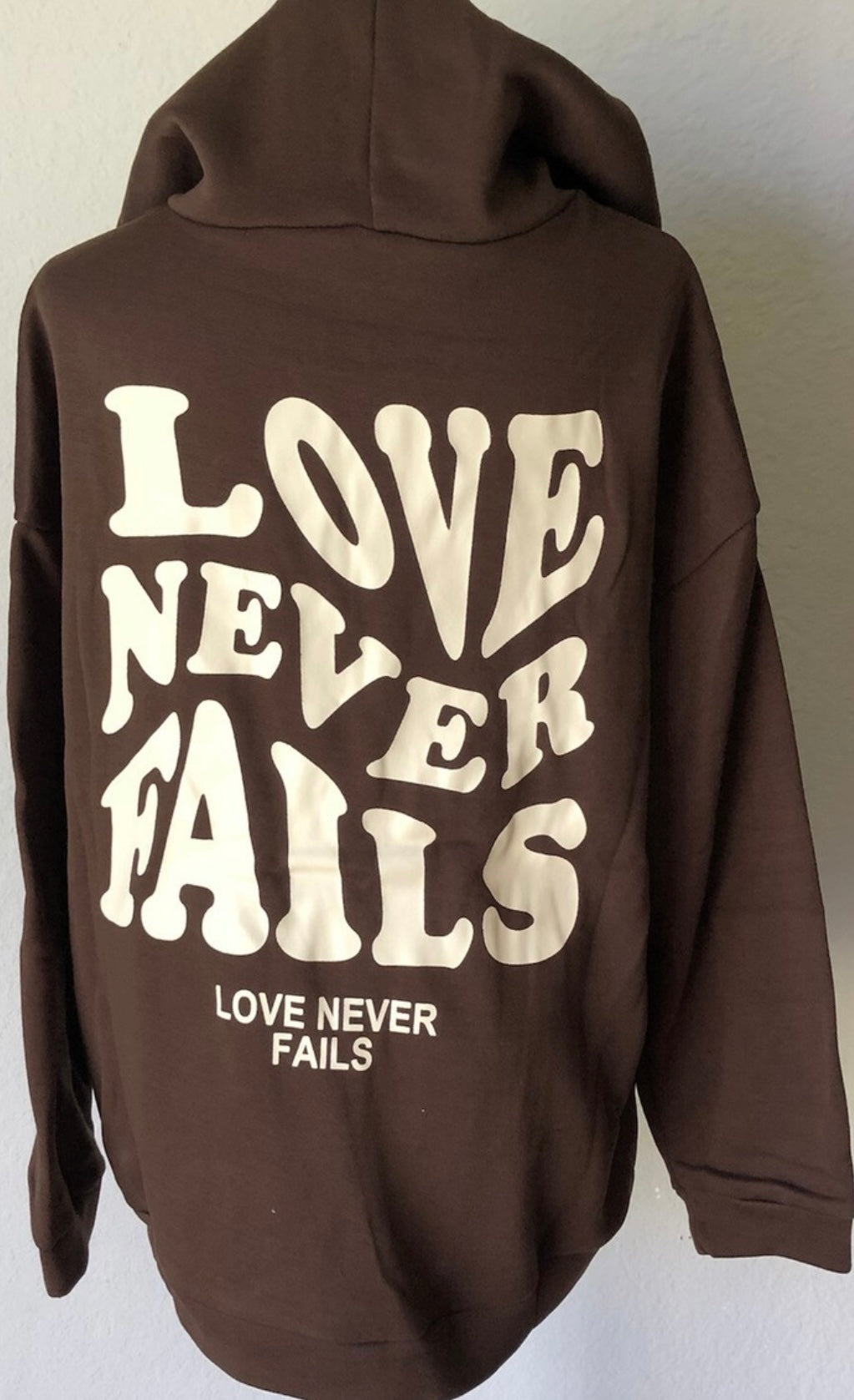 Shein “Love Never Fails” Graphic Drawstring Hoodie XS