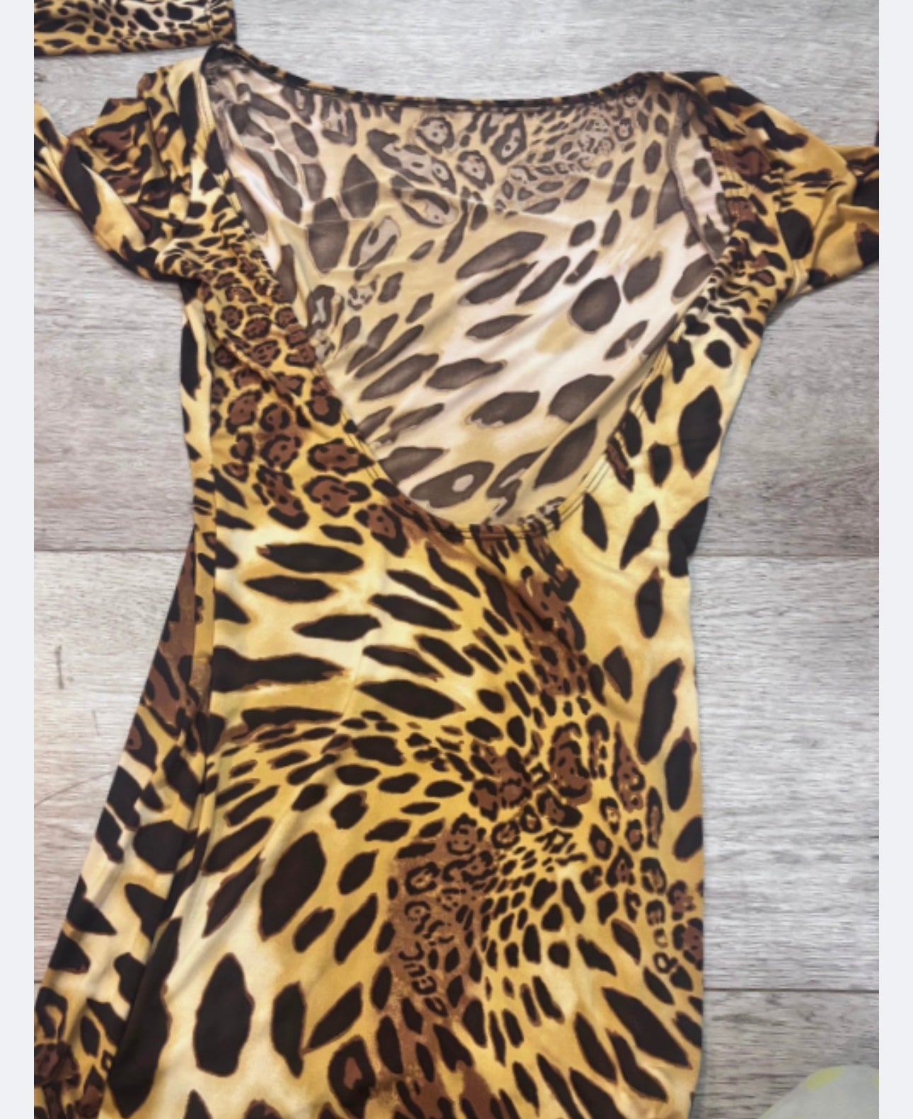 Fashion Junkie Leopard/Animal Print
Dress - Open Back (Size small )