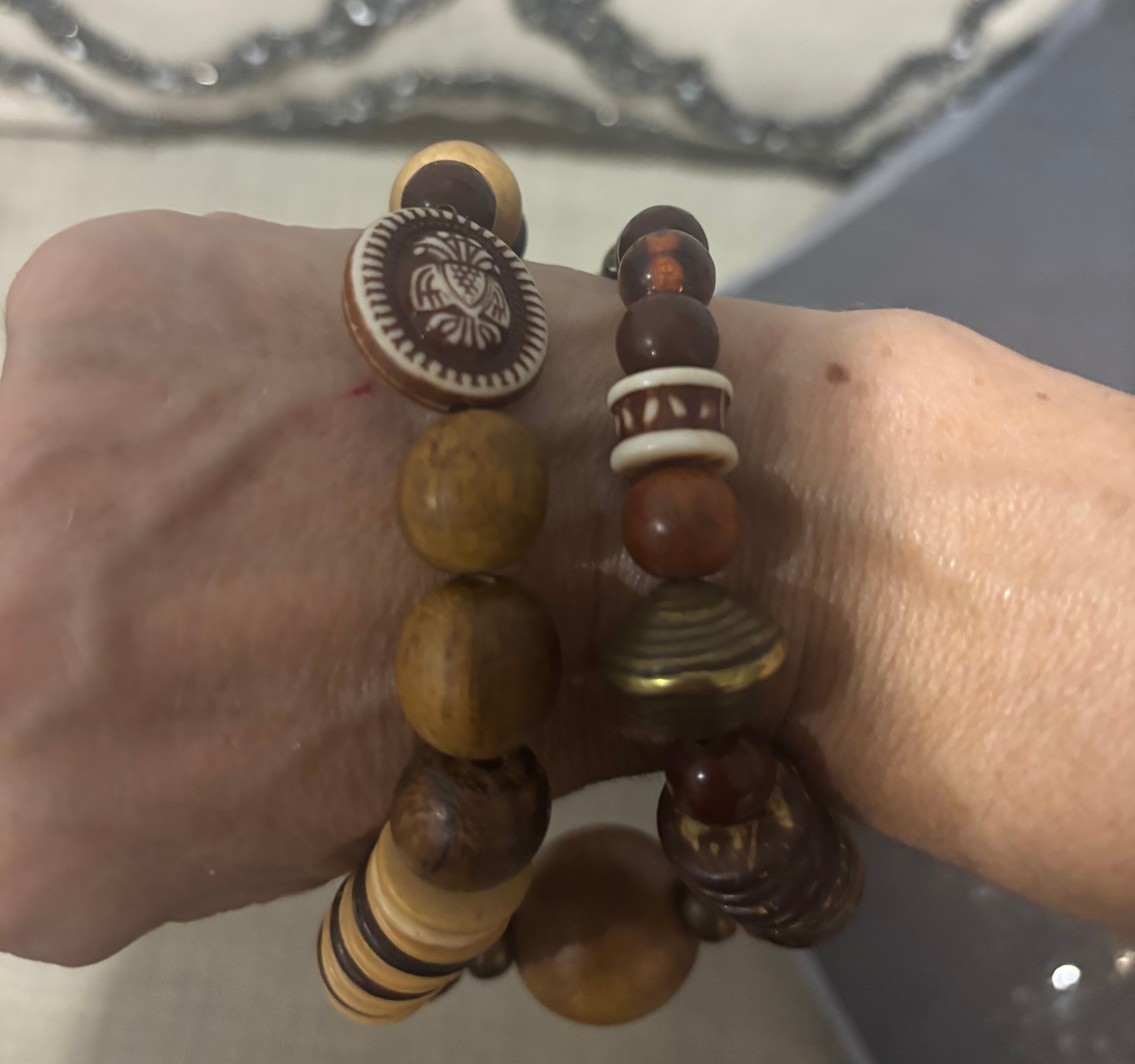 Handmade Bohemian necklace of natural wood, beads, and carved accents!