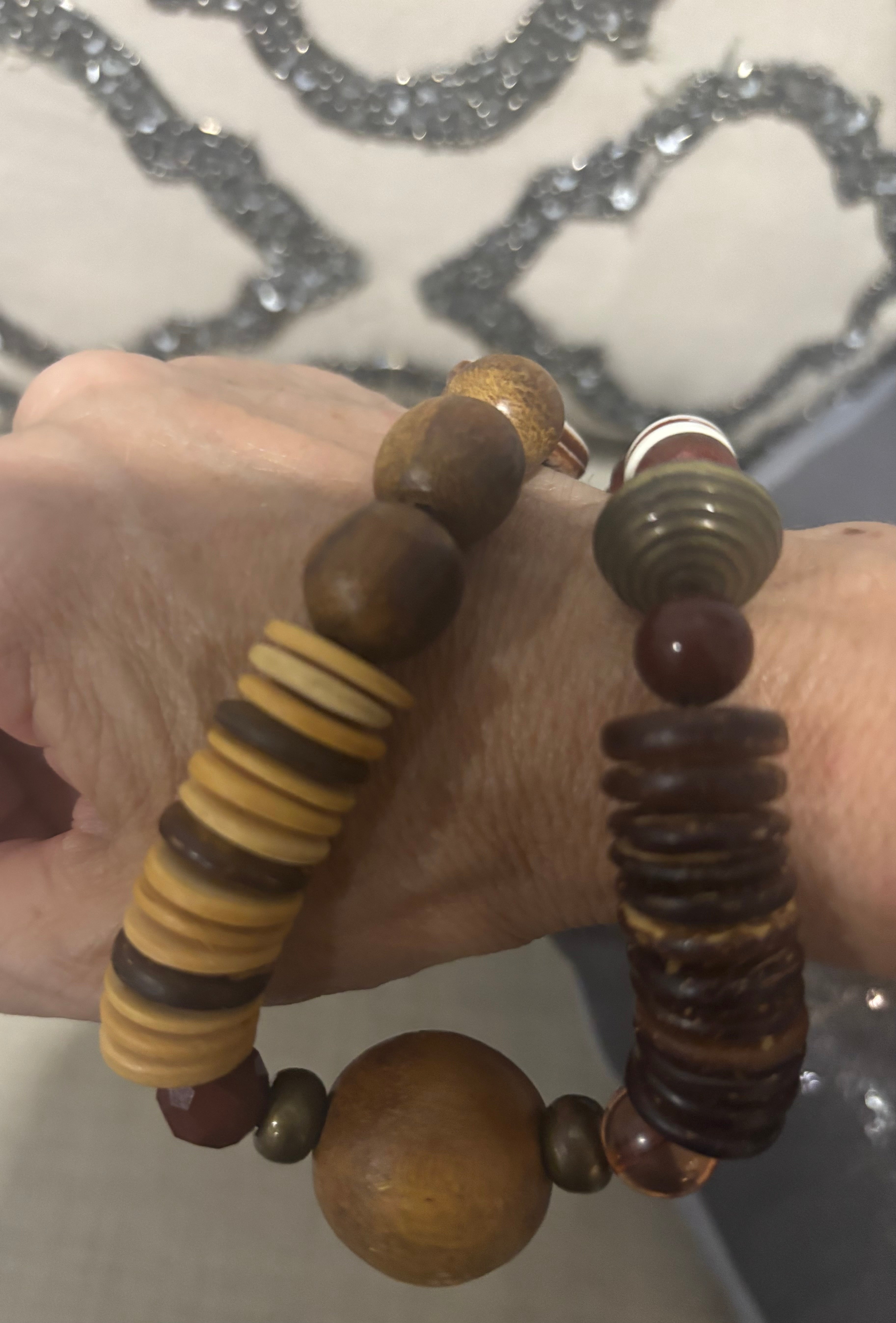 Handmade Bohemian necklace of natural wood, beads, and carved accents!