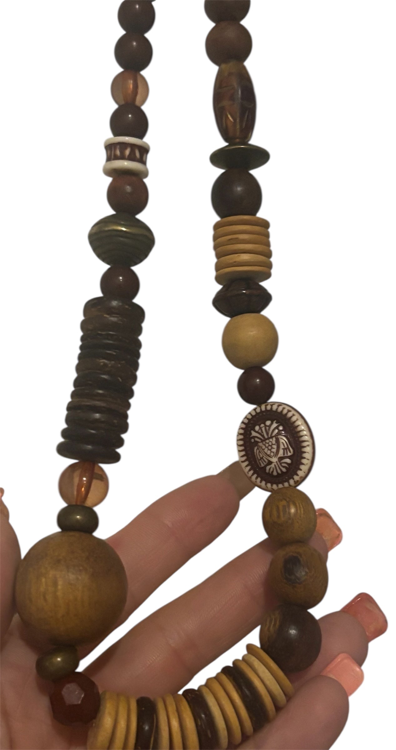 Handmade Bohemian necklace of natural wood, beads, and carved accents!